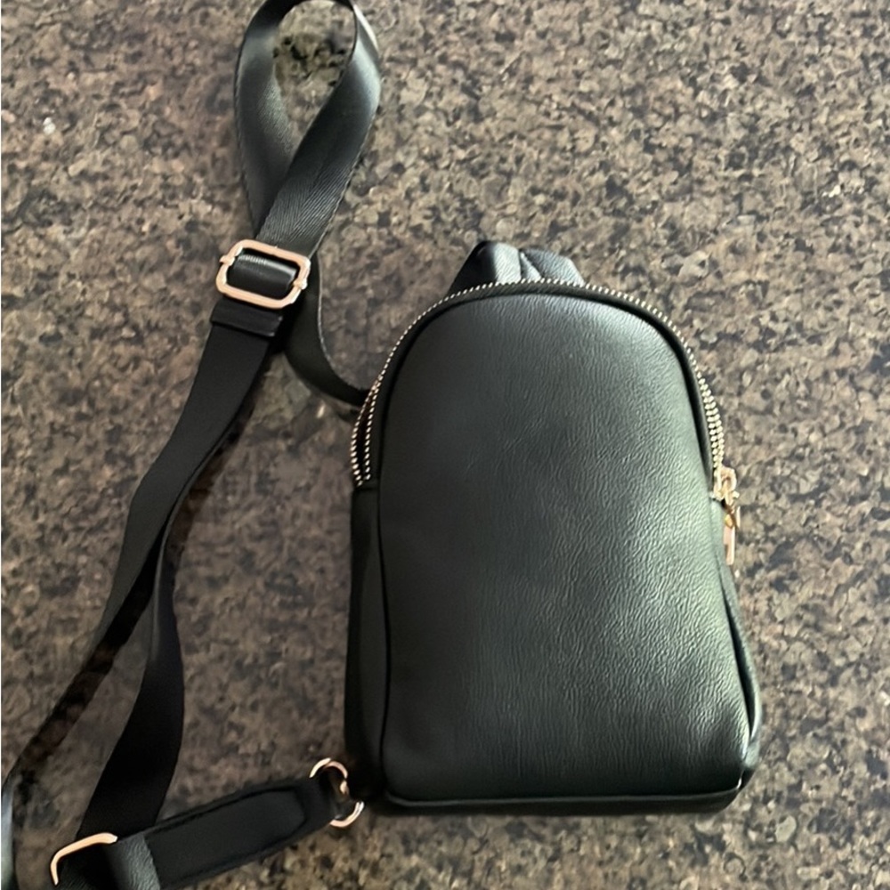 Black pebbled sling bag